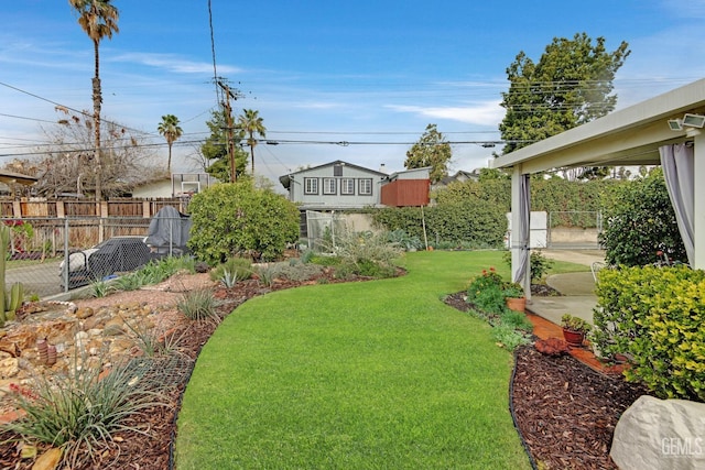 view of yard with fence