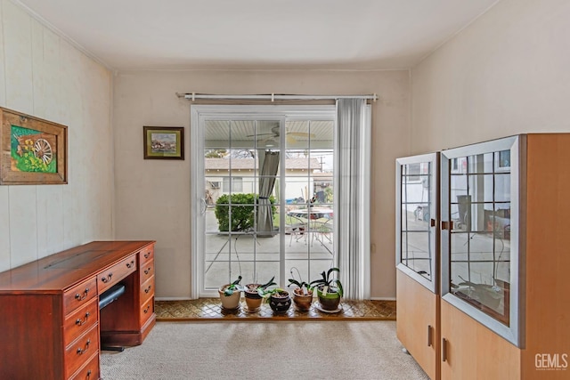 entryway with light colored carpet