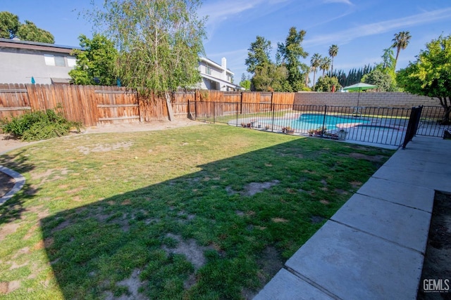 1805 Glenbrea Ct, Bakersfield, CA 93309 - view of yard with a fenced in pool and a fenced backyard