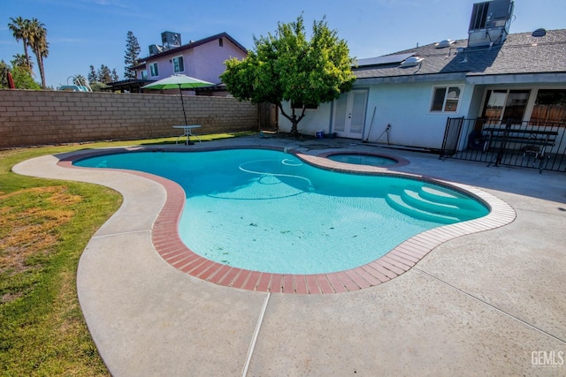1805 Glenbrea Ct, Bakersfield, CA 93309 - view of pool with a fenced in pool, a patio, a fenced backyard, and an in ground hot tub