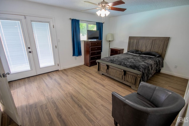 1805 Glenbrea Ct, Bakersfield, CA 93309 - bedroom with ceiling fan, baseboards, french doors, and light wood-style floors