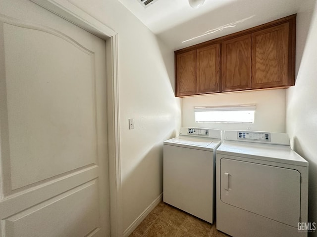 10304 Blythe Ct, Bakersfield, CA 93311 - laundry area with washing machine and clothes dryer, cabinet space, and baseboards