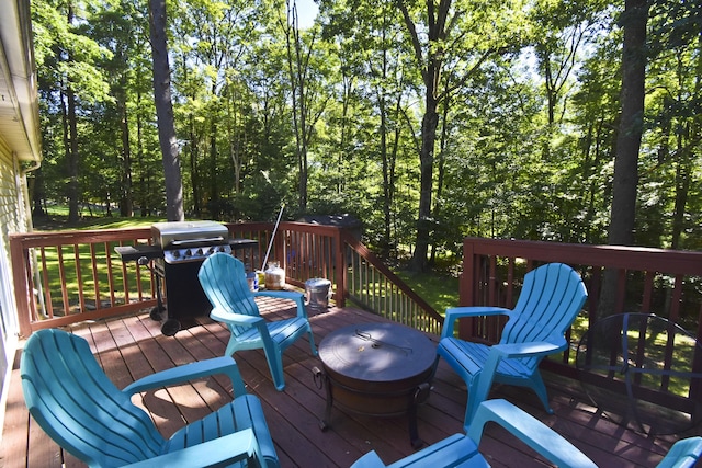 wooden terrace with grilling area