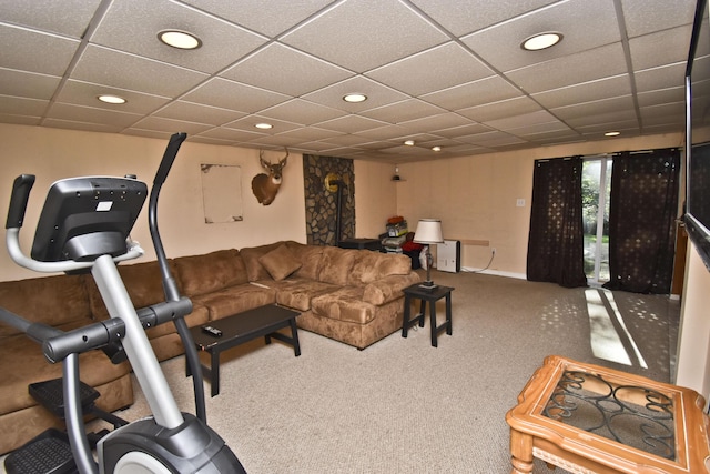 living room with recessed lighting, a paneled ceiling, and carpet flooring