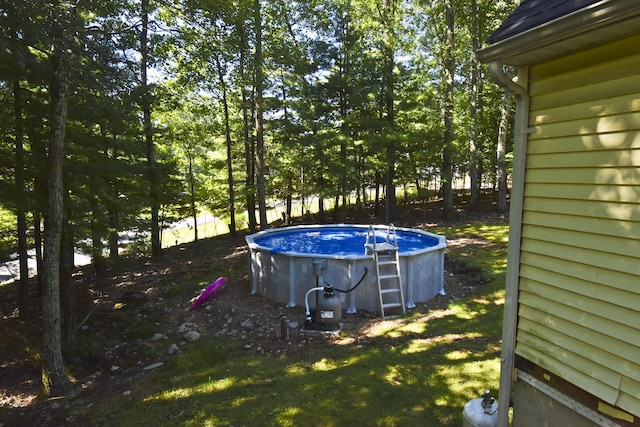 view of yard with an outdoor pool