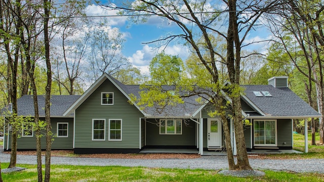 119 N Shore Dr, Albrightsville, PA 18210 - back of property featuring roof with shingles and a porch