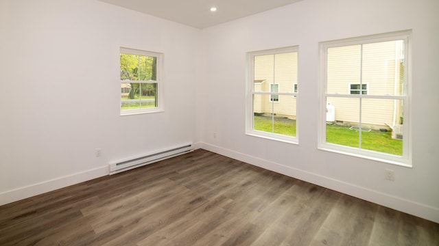 119 N Shore Dr, Albrightsville, PA 18210 - empty room featuring a baseboard heating unit, baseboards, dark wood-style floors, and recessed lighting