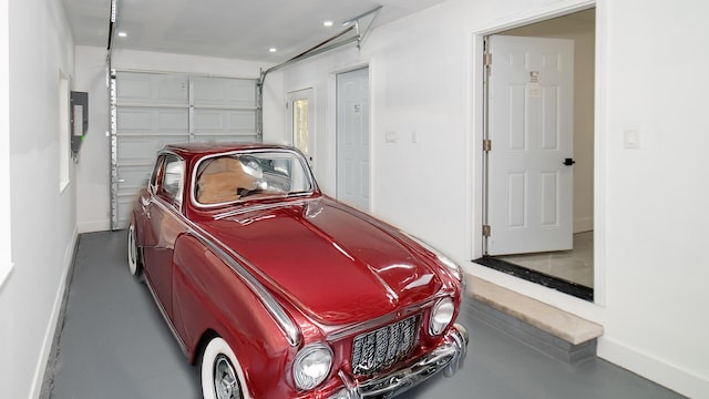 119 N Shore Dr, Albrightsville, PA 18210 - garage with baseboards, electric panel, and recessed lighting