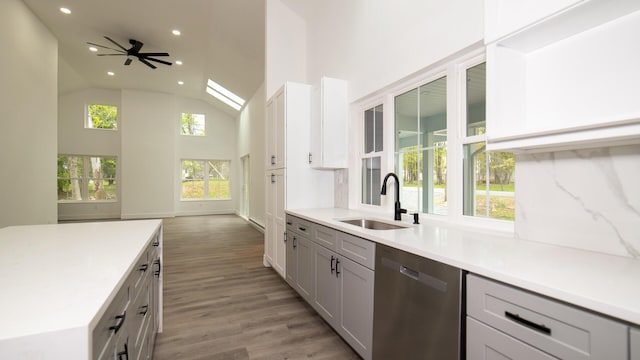 119 N Shore Dr, Albrightsville, PA 18210 - kitchen featuring stainless steel dishwasher, a sink, recessed lighting, light wood-style floors, and open floor plan