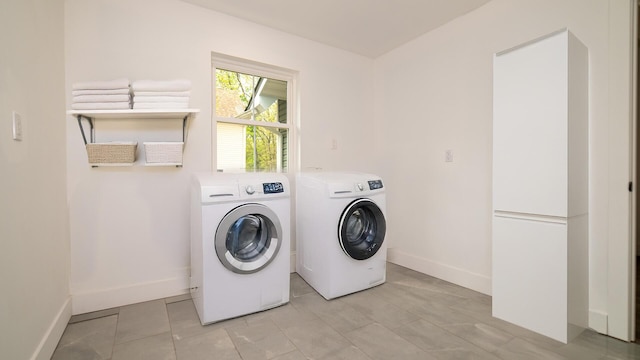 119 N Shore Dr, Albrightsville, PA 18210 - clothes washing area featuring washing machine and dryer and baseboards