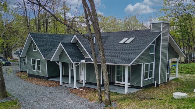 119 N Shore Dr, Albrightsville, PA 18210 - view of front of house featuring roof with shingles and a chimney