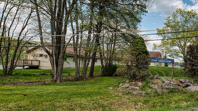 119 N Shore Dr, Albrightsville, PA 18210 - view of green lawn featuring a wooden deck