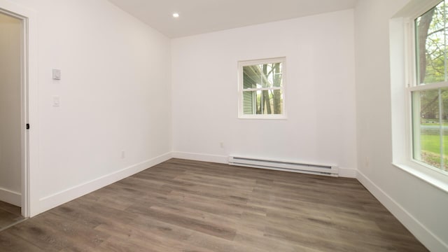 119 N Shore Dr, Albrightsville, PA 18210 - unfurnished room featuring a baseboard radiator, wood finished floors, baseboards, and recessed lighting