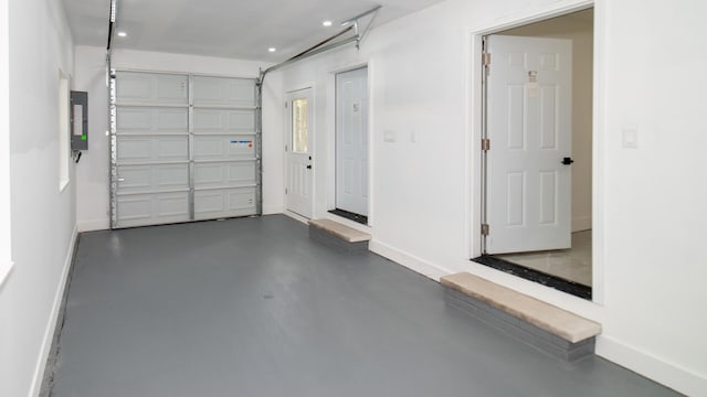 119 N Shore Dr, Albrightsville, PA 18210 - garage featuring electric panel, baseboards, and recessed lighting