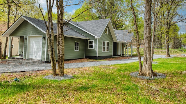 119 N Shore Dr, Albrightsville, PA 18210 - view of front of house featuring a shingled roof, a garage, a front yard, and gravel driveway