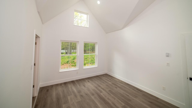 119 N Shore Dr, Albrightsville, PA 18210 - spare room with baseboards, dark wood finished floors, and high vaulted ceiling