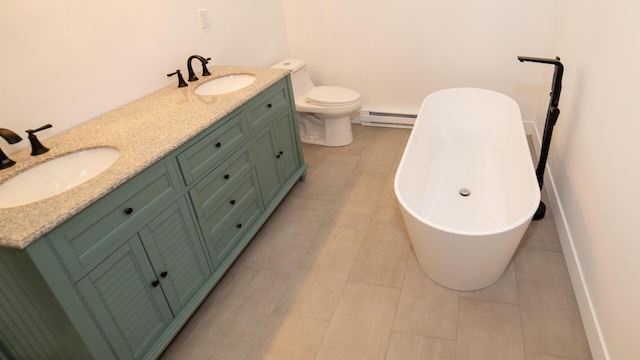 119 N Shore Dr, Albrightsville, PA 18210 - full bathroom featuring a soaking tub, a baseboard heating unit, double vanity, and tile patterned flooring