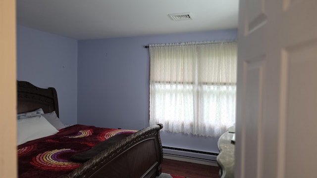 1977 Sun Valley Dr, Blakeslee, PA 18610 - bedroom featuring a baseboard heating unit and wood finished floors