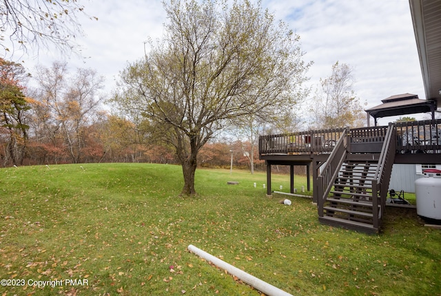 1977 Sun Valley Dr, Blakeslee, PA 18610 - view of green lawn featuring a gazebo, a deck, and stairs