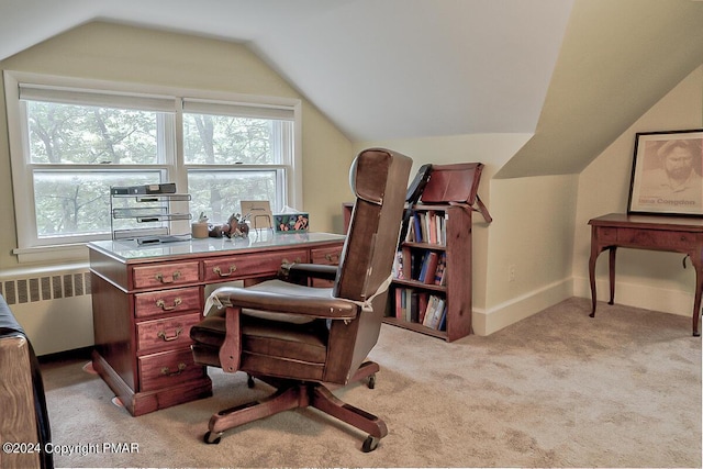 office featuring radiator, baseboards, lofted ceiling, and light colored carpet