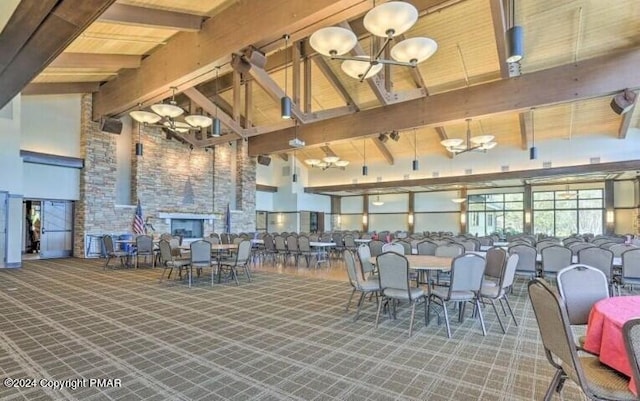 dining room with carpet floors, high vaulted ceiling, beam ceiling, and a notable chandelier