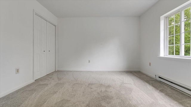 79 Delaware Dr, Jim Thorpe, PA 18229 - unfurnished bedroom with a baseboard heating unit, carpet floors, and baseboards