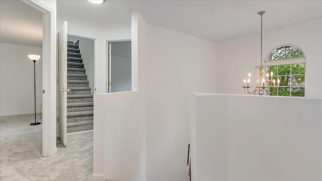 79 Delaware Dr, Jim Thorpe, PA 18229 - corridor featuring carpet floors, stairway, and a chandelier