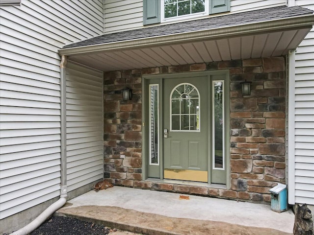 79 Delaware Dr, Jim Thorpe, PA 18229 - property entrance featuring stone siding and a shingled roof