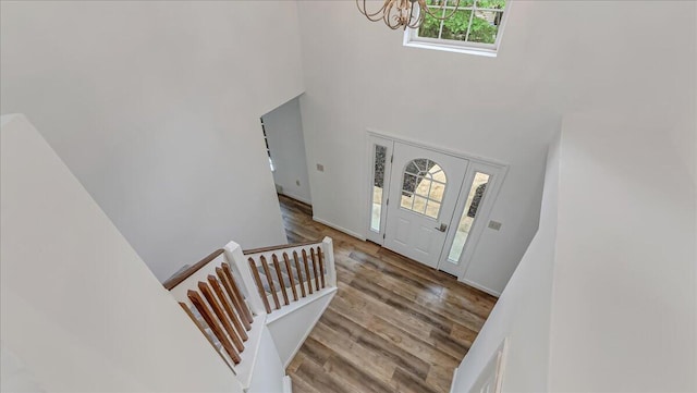 79 Delaware Dr, Jim Thorpe, PA 18229 - foyer with a chandelier, a towering ceiling, and wood finished floors