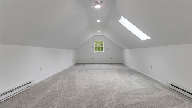 79 Delaware Dr, Jim Thorpe, PA 18229 - additional living space featuring baseboard heating, lofted ceiling, carpet flooring, a skylight, and recessed lighting