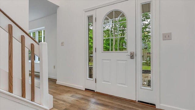 79 Delaware Dr, Jim Thorpe, PA 18229 - foyer with wood finished floors, a baseboard radiator, and baseboards