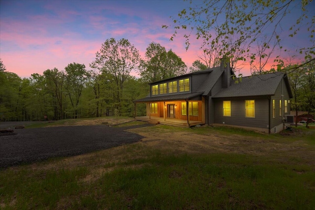 1448 Lake Ln, Pocono Lake, PA 18347 - back of house featuring a porch and a chimney