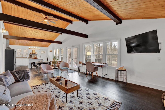 living area featuring dark wood-type flooring, french doors, and vaulted ceiling with beams