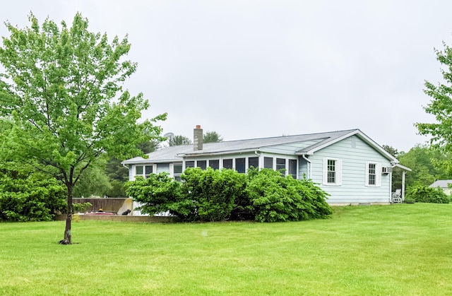 353 Bollinger Rd, Kunkletown, PA 18058 - rear view of house featuring a yard and a chimney