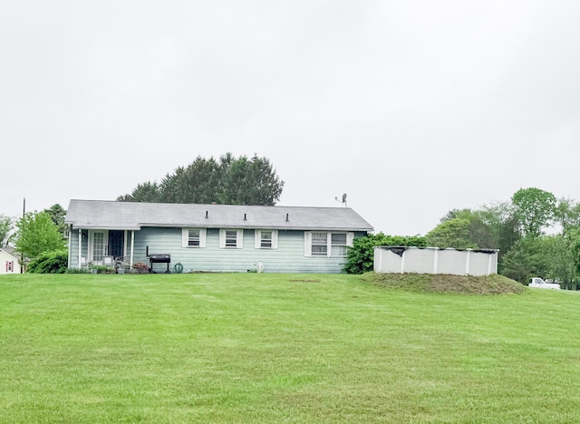 353 Bollinger Rd, Kunkletown, PA 18058 - rear view of property featuring a lawn and a covered pool