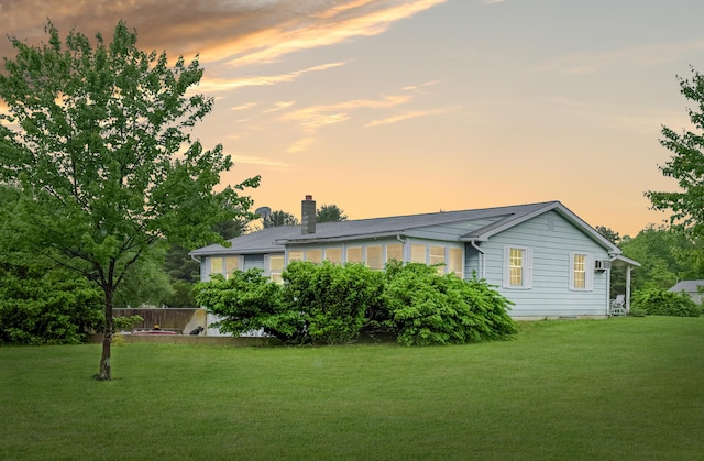 353 Bollinger Rd, Kunkletown, PA 18058 - property exterior at dusk with a yard and a chimney