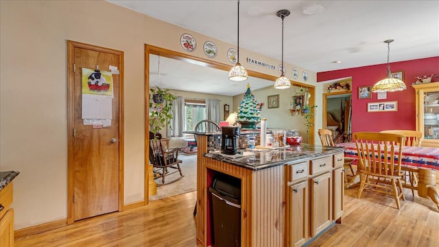 600 N Harrity Rd, Palmerton, PA 18071 - kitchen featuring light wood-type flooring, dark countertops, hanging light fixtures, and a center island