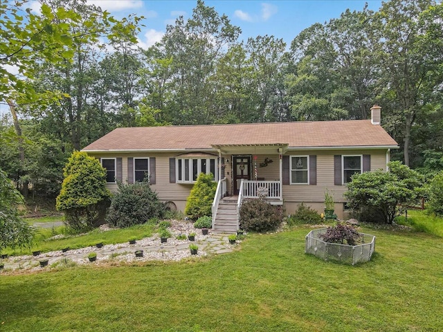 600 N Harrity Rd, Palmerton, PA 18071 - ranch-style house featuring a front lawn, a chimney, stairway, and covered porch