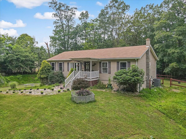 600 N Harrity Rd, Palmerton, PA 18071 - ranch-style home featuring a front lawn, a porch, a chimney, and view of scattered trees