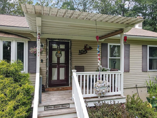 600 N Harrity Rd, Palmerton, PA 18071 - doorway to property with covered porch and roof with shingles