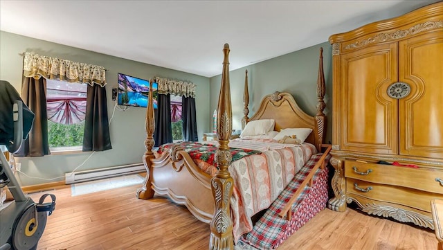 600 N Harrity Rd, Palmerton, PA 18071 - bedroom with a baseboard heating unit and light wood-style flooring