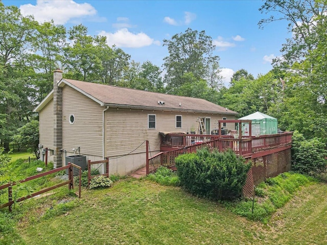 600 N Harrity Rd, Palmerton, PA 18071 - back of house with a wooden deck, a chimney, and a lawn