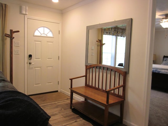 2016 Locust Ridge Rd, Pocono Lake, PA 18347 - entrance foyer featuring ornamental molding, wood finished floors, baseboards, and ceiling fan