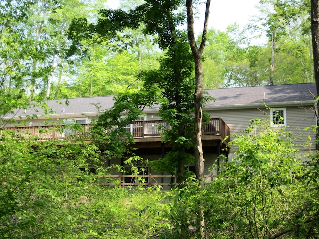 2016 Locust Ridge Rd, Pocono Lake, PA 18347 - rear view of house with a wooden deck