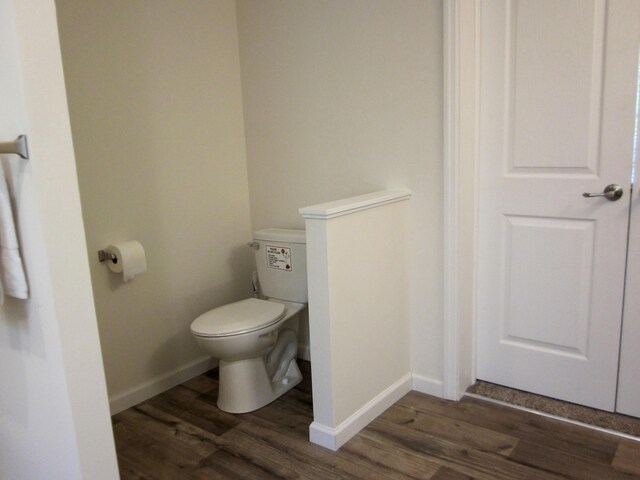 2016 Locust Ridge Rd, Pocono Lake, PA 18347 - bathroom featuring wood finished floors, toilet, and baseboards