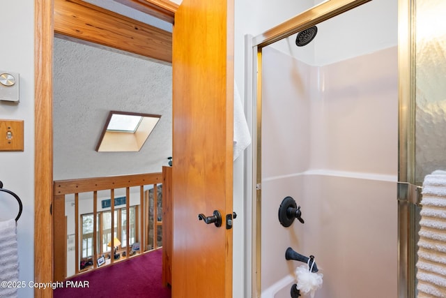 2222 Hillcrest Dr, Pocono Pines, PA 18350 - bathroom featuring a skylight and a textured ceiling