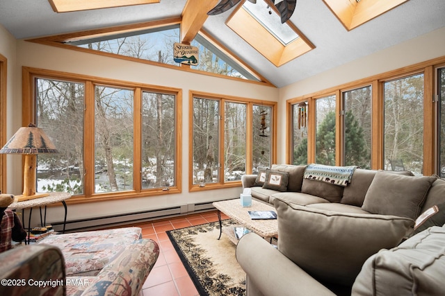 sunroom with baseboard heating and lofted ceiling with skylight