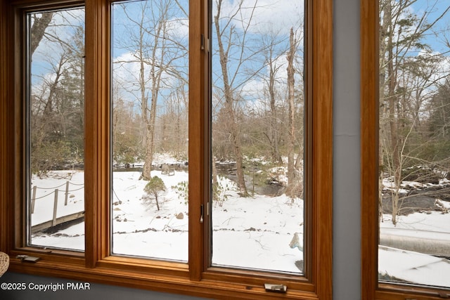 doorway to outside featuring a healthy amount of sunlight