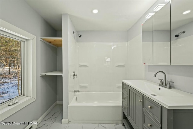 bathroom featuring vanity and shower / washtub combination