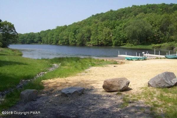 158 Saunders Dr, Bushkill, PA 18324 - water view featuring a forest and a dock